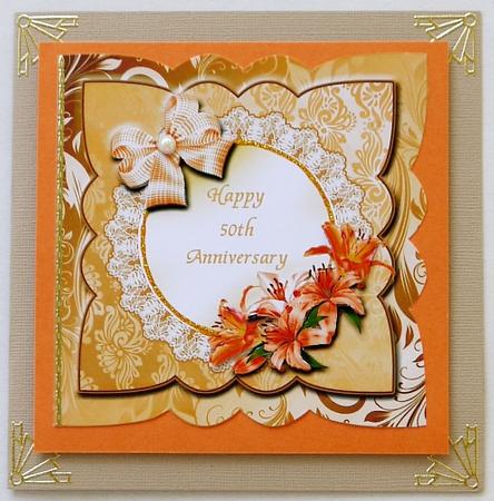 Golden Wedding Anniversary Card Front with Lilies and Bow by Margaret Dittmann