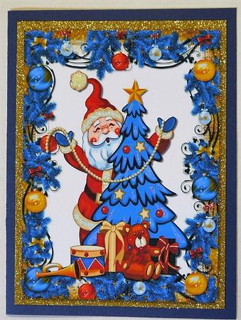 Santa with Christmas Tree and Toys in Blue Frame A4 by Margaret Dittmann