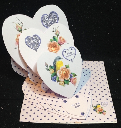 Pink triple heart easel anniversary card with matching envelope by Margaret Hanning