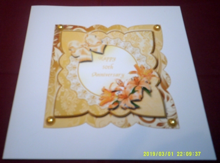 Golden Wedding Anniversary Card Front with Lilies and Bow by Margaret Hanning