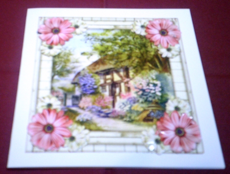 New Home Cottage in wooden frame & flowers by Margaret Hanning
