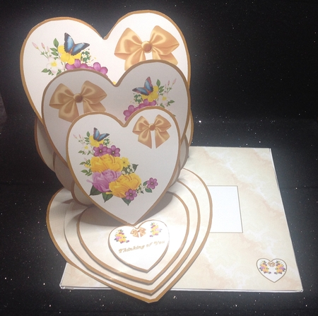 Brown, peach & gold floral heart shaped triple easel card with matching envelope. by Margaret Hanning