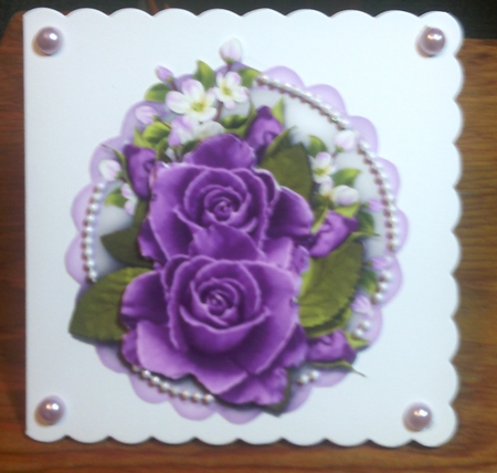 Purple Roses and Blossom  by Margaret Hanning