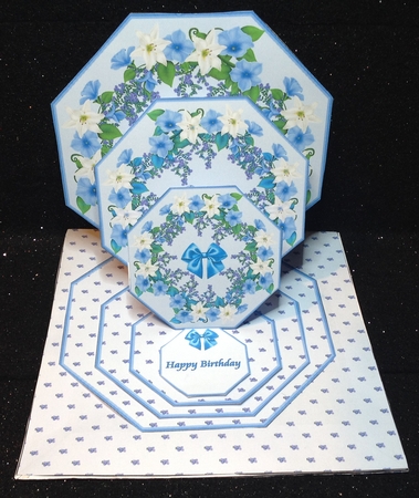 Blue floral octagonal triple easel card and matching envelope. by Margaret Hanning