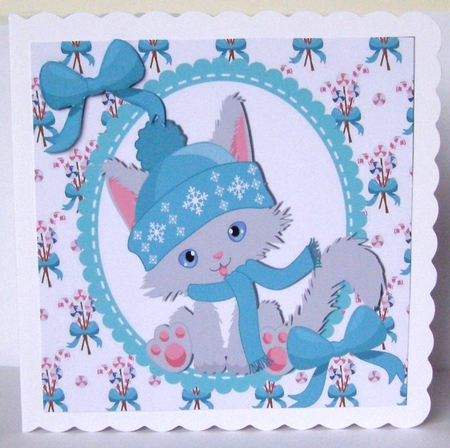 cute kitty in turq in scalloped oval frame with bows 7x7 by Margaret McCartney