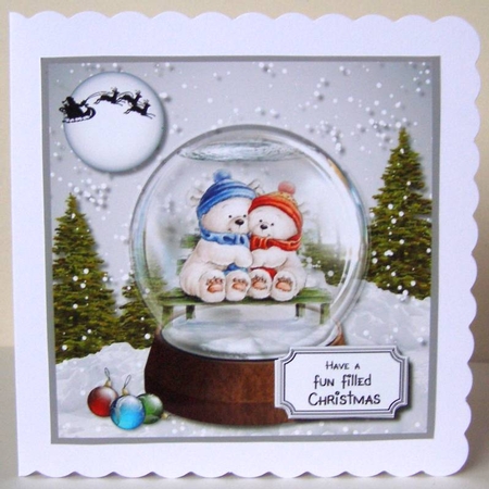 Snow globe with snowman and woman by Margaret McCartney
