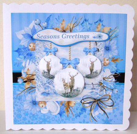 Blue winter stag bauble Christmas card front by Margaret McCartney