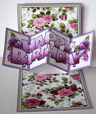 Twist & pop Purple roses by Margaret McCartney