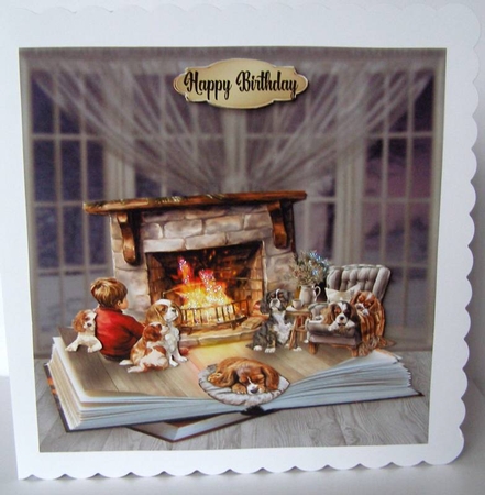 spaniels by the fire by Margaret McCartney