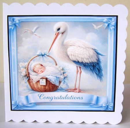 Baby boy and stork by Margaret McCartney