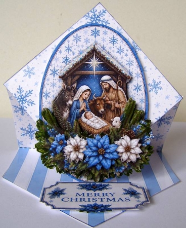 Blue Nativity Christmas Topper – Holy Family Scene with Merry Christmas Label by Margaret McCartney