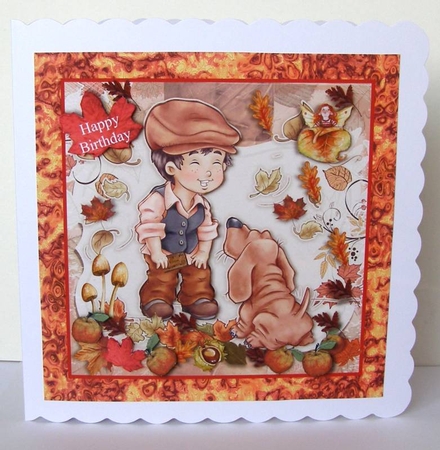 A boy and his dog kicking up the leaves by Margaret McCartney