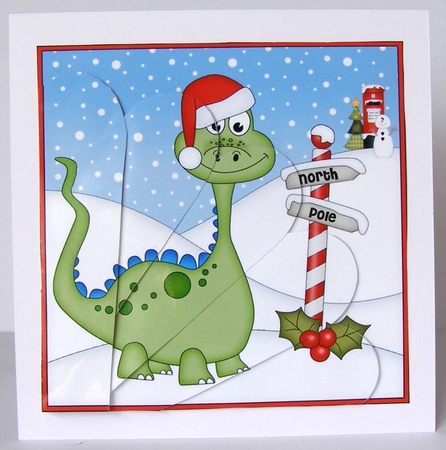 Christmas Dinosaur is at the North Pole Fan Pyramage Topper by Margaret McCartney