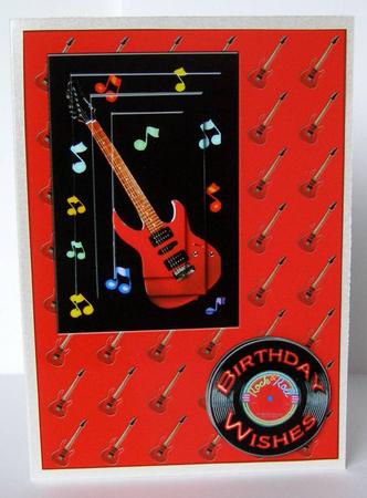 Red Guitar Rocking on Red by Margaret McCartney