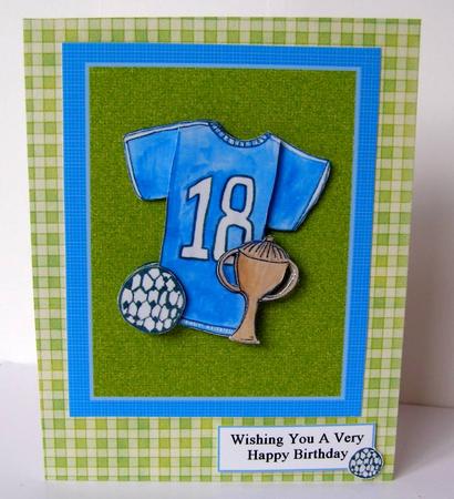 Football Mad Blue Football Shirt Decoupage on Grass Backgrou by Margaret McCartney
