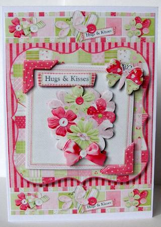Hugs & Kisses Pink and Flowery Card Front by Margaret McCartney