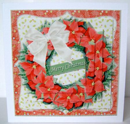 Pointsettia Merry Christmas Wreath Pyramid Card Front by Margaret McCartney