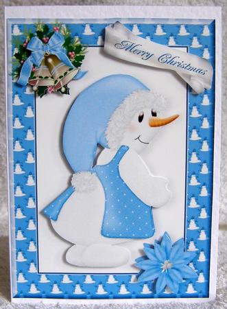 Christmas Snowlady in Blue Frame by Margaret McCartney
