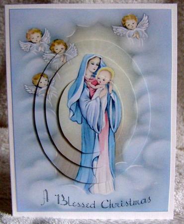 A Vintage Christmas Mary with Child Oval Pyramid by Margaret McCartney