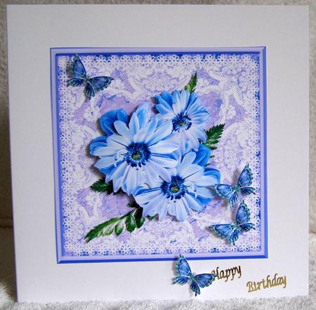 Blue Flowers on a Square Lace Frame by Margaret McCartney