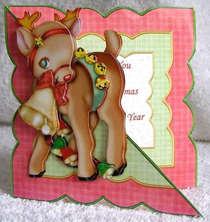 Reindeer & Bell Christmas Over the Edge by Margaret McCartney