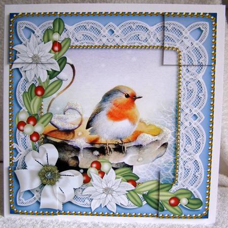 Robin Blue Ice Poinsettia 8in Picture Topper by Margaret McCartney