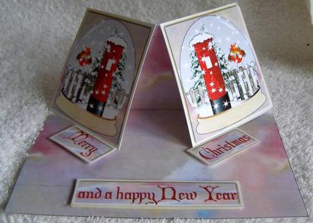 Robin on a Fence Snowglobe by Margaret McCartney