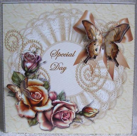 Cream Roses Butterflie Beauty by Margaret McCartney