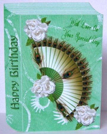 Ladies Peacock Feathered Fan with Cream Roses Folded Book by Margaret McCartney