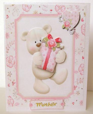 Cute Valentine Bear Holding a Present by Margaret McCartney