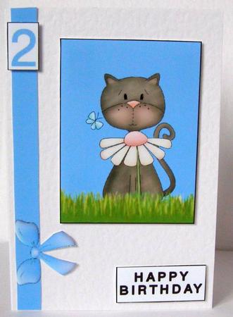 Grey Cat in a Grass by Margaret McCartney