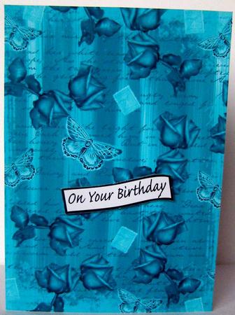 Teal Painted Rose Butterfly A4 Backing Paper by Margaret McCartney
