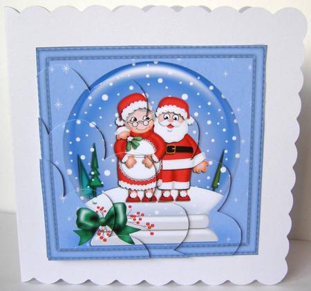 Xmas Mr N Mrs Claus Snowglobe Shell Edged Corner Stacker by Margaret McCartney