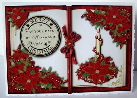 Red Poinsettias Open Book Topper by Margaret McCartney