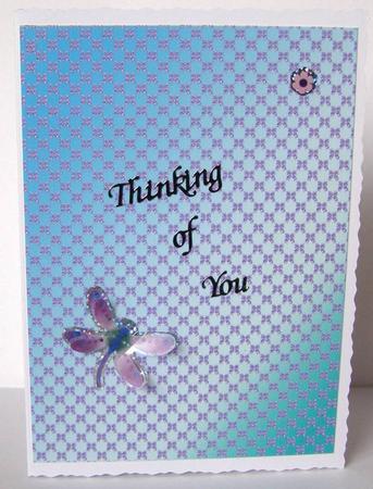 Christmas Purple Bows on Blue Background by Margaret McCartney
