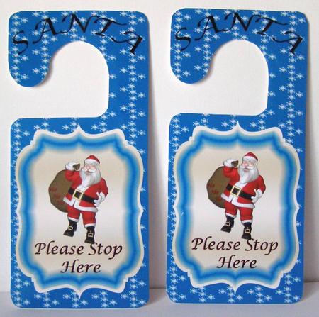 Blue Santa Door Hanger by Margaret McCartney