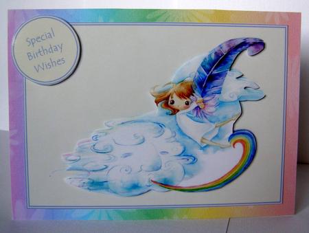 Darling Little Flower Girl Floating Over the Rainbow by Margaret McCartney