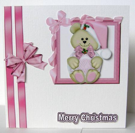 Christmas Teddy in Pink Bow Frame by Margaret McCartney