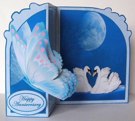 Butterfly Fold Back swans by Margaret McCartney
