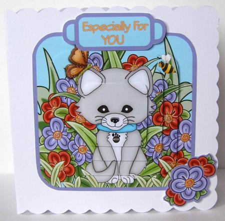 Kitty Among the Flowers by Margaret McCartney
