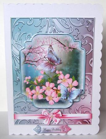 The Cherry Blossom Flutters in a Shimmering Frame by Margaret McCartney