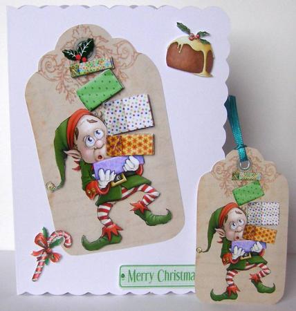 Santas Elf with Pressies on a Tag by Margaret McCartney