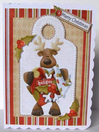 Cute Reindeer with Believe Love Heart by Margaret McCartney