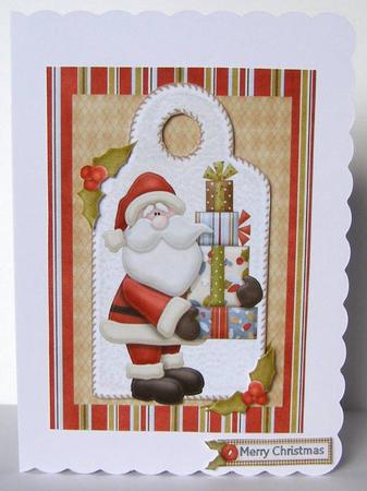 Santa Juggling a Stack of Presents by Margaret McCartney