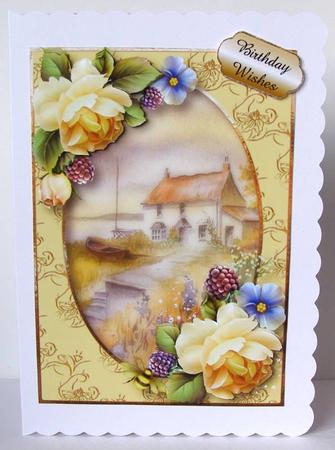 Cottage by the Sea with Soft Yellow Roses by Margaret McCartney