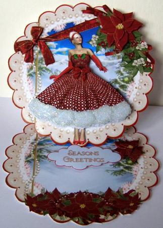 Fifties Christmas Lady Scalloped Round Easel Card by Margaret McCartney