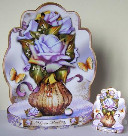 Purple Roses in Vase by Margaret McCartney