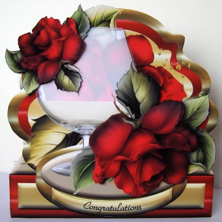 Celebratory Month - Red Roses by Margaret McCartney