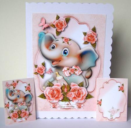 Cute Baby Elephant with Soft Roses by Margaret McCartney