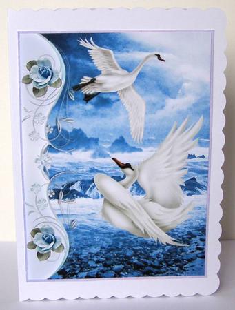 Beautiful Fantasy Swans with the Ocean, and Blue Roses A4 by Margaret McCartney